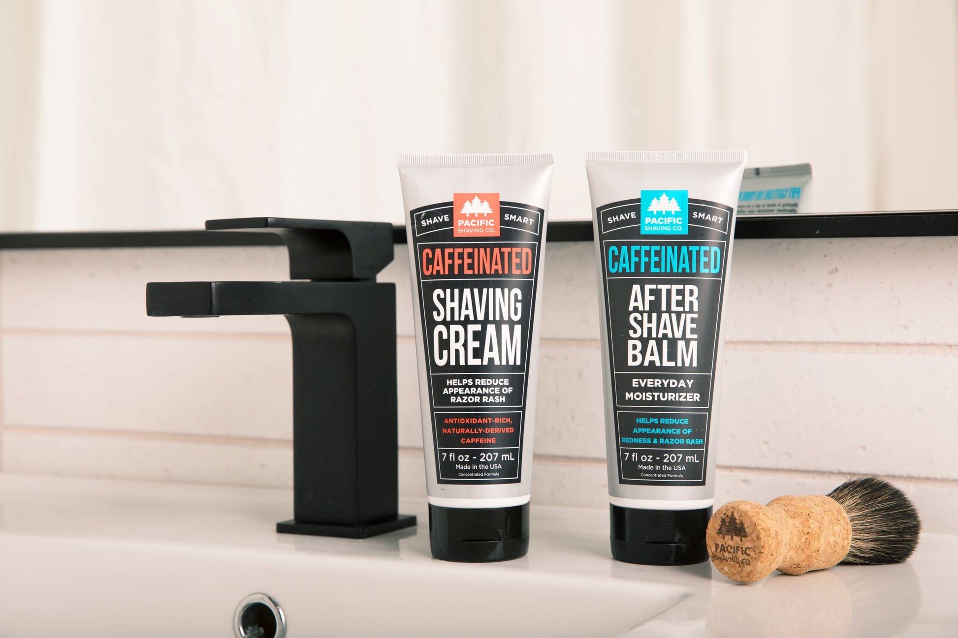 Caffeinated Shaving Cream and Aftershave Set with shave brush on sink.